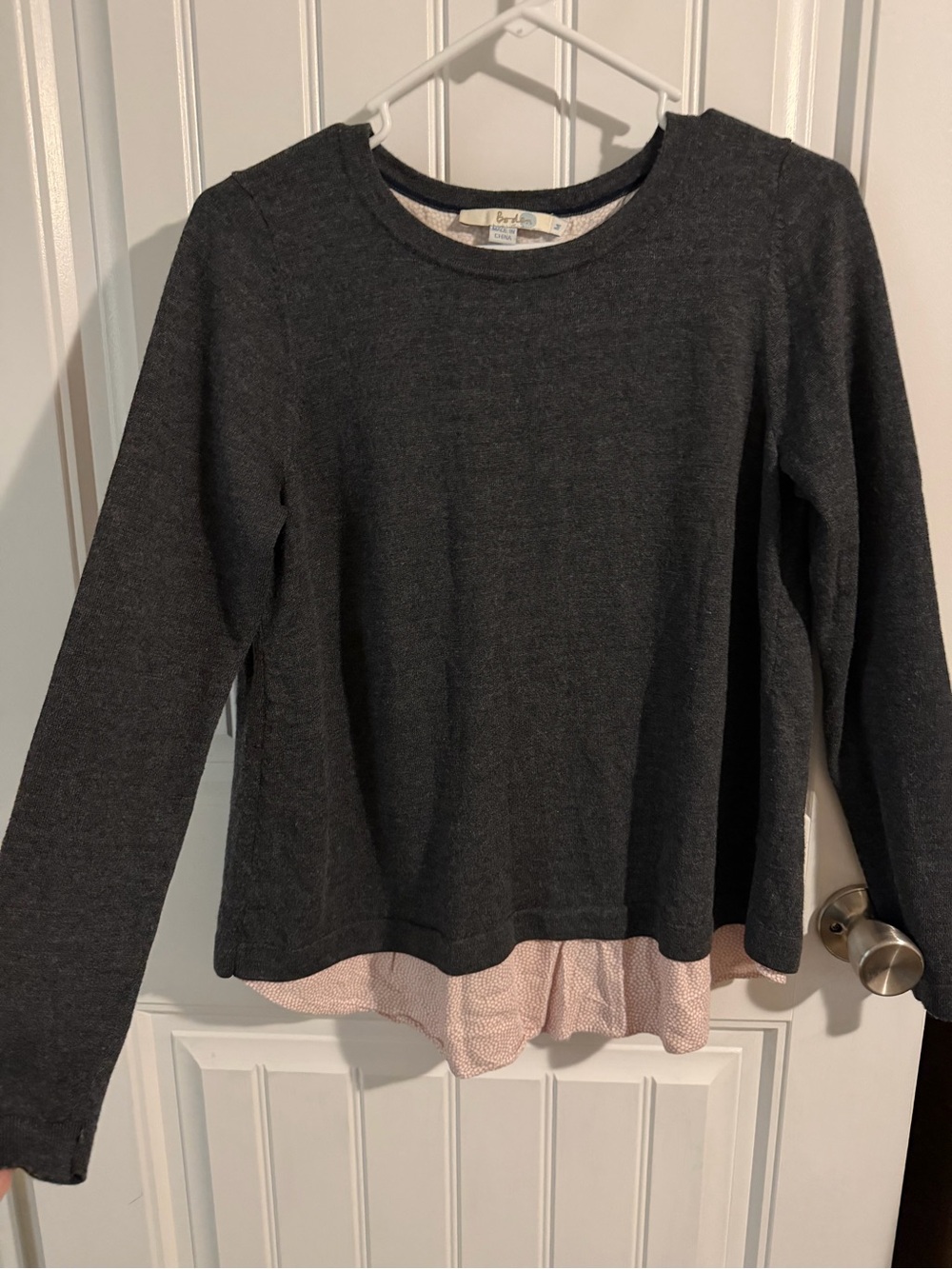 Boden Charcoal Gray Crewneck Sweater with Pink Dot Layered Hem under layer